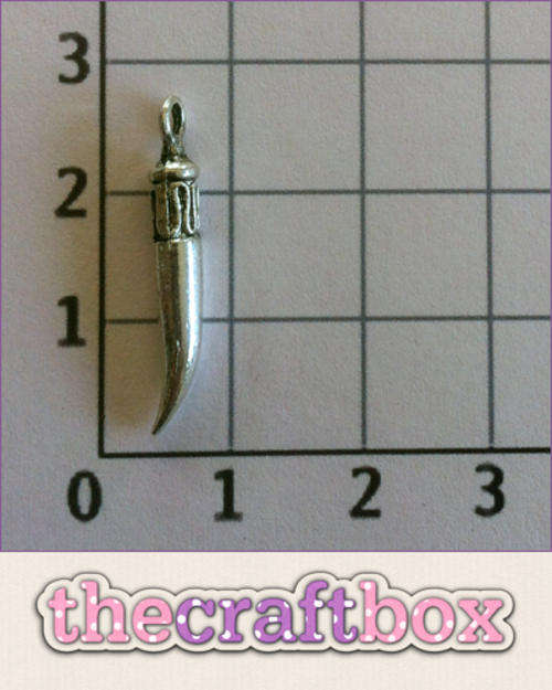 Tusk Charm (10 pieces)