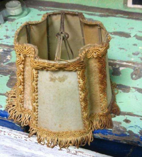 A set of Four little 'clip on' vintage lamp shades