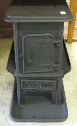 A quaint early 20thC Cast iron COAL STOVE