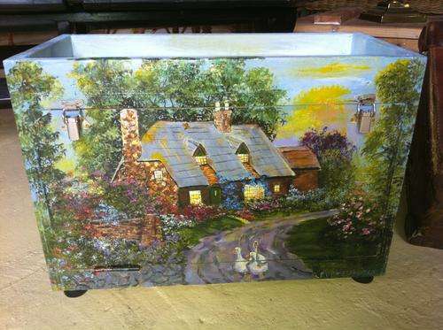 Box with fold down door and inner pull out shelf beautifully painted with a cottage scene