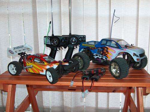 2 x Radio Remote Controll Cars, with remotes, 1 spare batt & charger