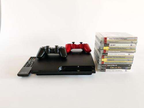PS3 Slim 250GB Bundle With 2 Controllers, Multimedia Remote & 11 Games Great Condition!