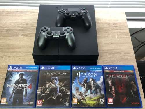 Sony Playstation 4 1TB Bundle Great Condition! 2 Original Controllers and 4 Games!