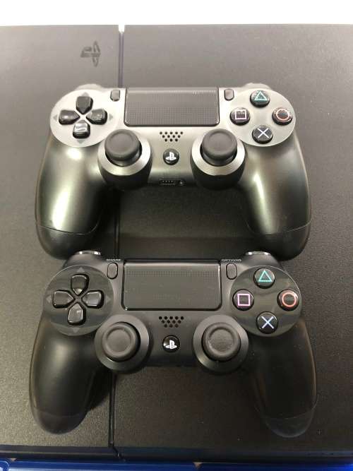 Sony Playstation 4 1TB Bundle Great Condition! 2 Original Controllers and 4 Games!
