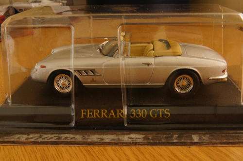 Ferrari 330 GTS diecast model car 1:43 on base