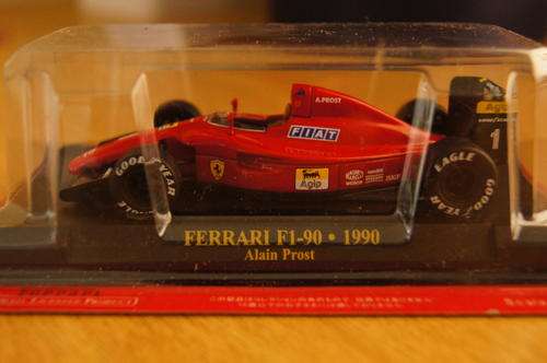 Ferrari F1-90 1990 Alain Prost diecast 1:43 model car on base