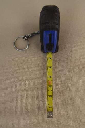 Keyring with measuring tape
