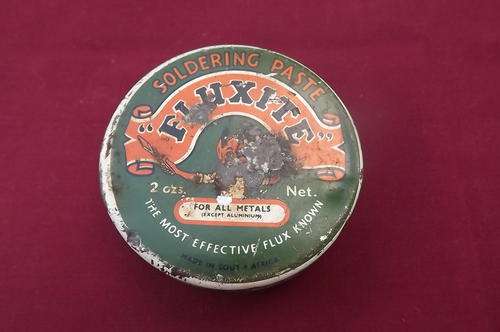 Fluxite small empty tin 2 oz.