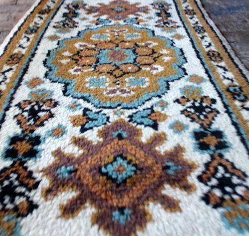 Delightful hand-knotted wool rug in excellent condition.