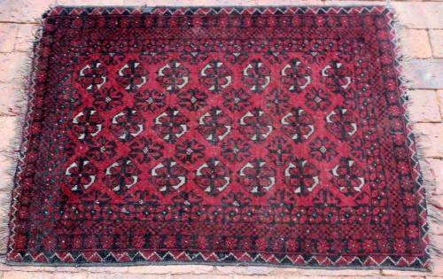 A lovely hand-knotted Afghan rug in excellent condition