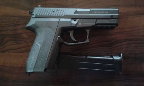 KWC SP2022 SIGPRO,,0.177 CAL,4.5MM,,SECOND-HAND,,HALF METAL STEEL BB PISTOL  ,WITH ONE CO2 CANISTER.