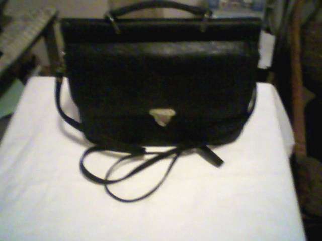 BLACK LEATHER HANDBAG. VERY UNIQUE OPENS ON BOTH SIDES.