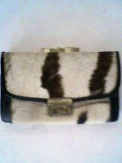 BROWN AND BEIGE FUR PURSE. 12 X 7,5 cm