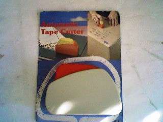 AUTOMATIC TAPE CUTTER.