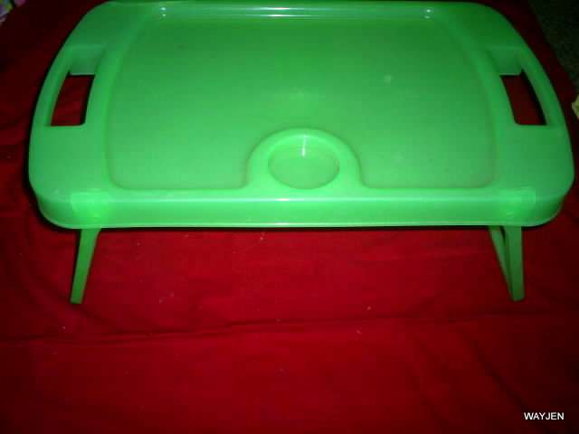GREEN BREAKFAST/TV/CAMPING OR TRAVEL TRAY WITH FOLD UP LEGS. 56 X 33cm. NOTE CRACK ON CORNER.