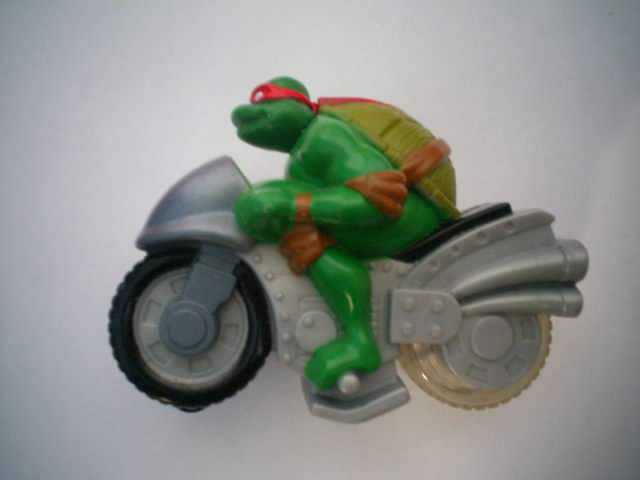 NINJA TURTLE.RAPHAEL ON MOTORBIKE.