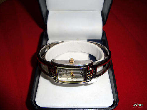 ANNE KLEIN TWO TONE BANGLE WATCH. WORKING 100% SERIAL NO: 10-7551 Y121E.JAPAN QUARTZ.