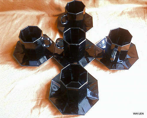 SET OF 5 OCTAGONAL BLACK CUPS AND SAUCERS. NO CHIPS OR CRACKS.