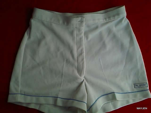PRINCESS. SIZE 12. POLYESTER SPORT SHORTS. WHITE WITH BLUE DETAIL AROUND LEGS. WORKING ZIP.