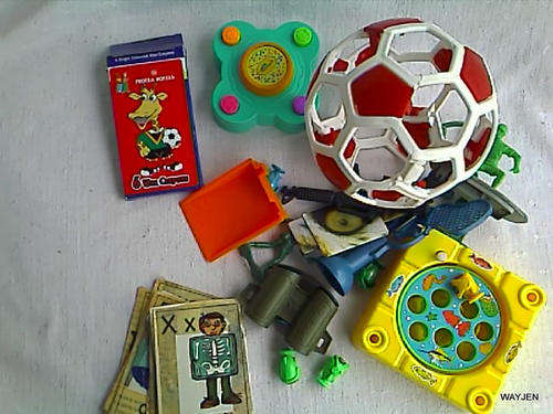 SKILLS BALL AND VARIOUS ODD SMALL TOYS.