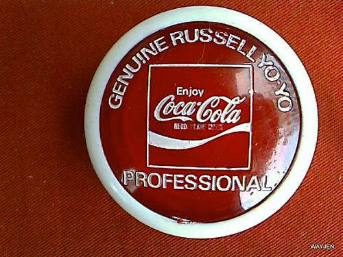 GENUINE RUSSELL COCA COLA YO-YO. PROFESSIONAL. NO STRINGS ATTACHED. RED SEE-THRU PLASTIC.