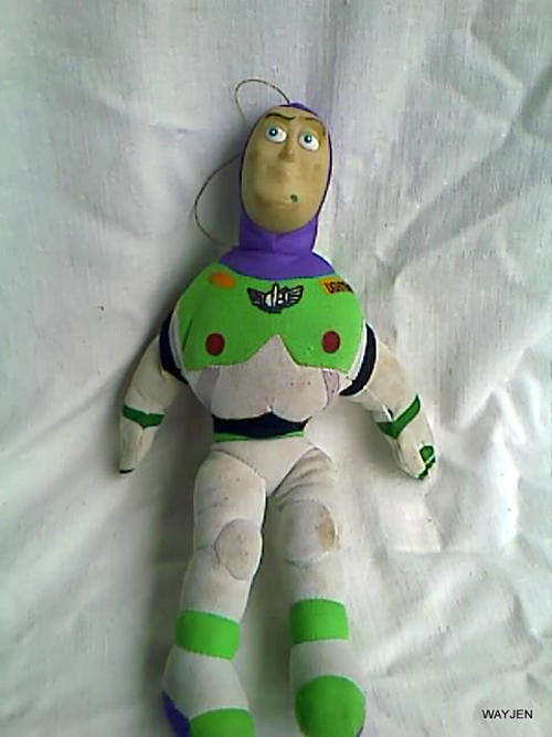 BIG SOFT TOY BUZZ LIGHTYEAR.RUBBER FACE BUT SOFT BODY. DOLL IS A BIT GRUBBY.