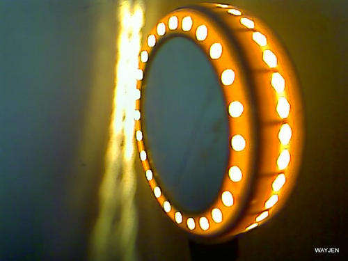 A RARE FIND.VINTAGE HANDHELD MIRROR WITH LIGHTS.ON/OFF SWITCH.CLOSE-UP & NORMAL MIRROR ON EACH SIDE,