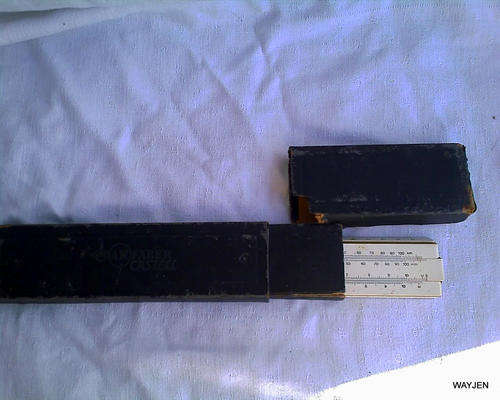 A.W. FABER CASTELL SCIENTIFIC SLIDE RULER. IN BOX BUT BOX IS DAMAGED.