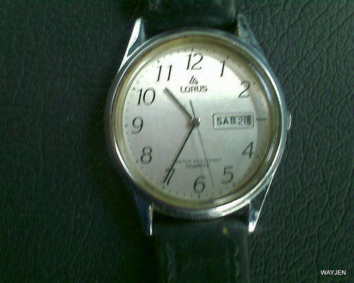 LORUS WATCH. PLASTIC BACK. NOT WORKING