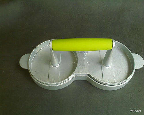 MAKE YOUR OWN HAMBURGER PATTIES IN THIS DUAL CAST ALUMINIUM HAMBURGER PATTIE PRESS. VERY NEAT.
