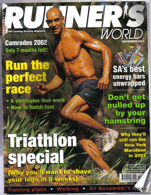 RUNNER'S WORLD  MAGAZINE. NOVEMBER 2001. FULL OF INTERESTING ARTICLES. SOME WEAR TO MAGAZINE.