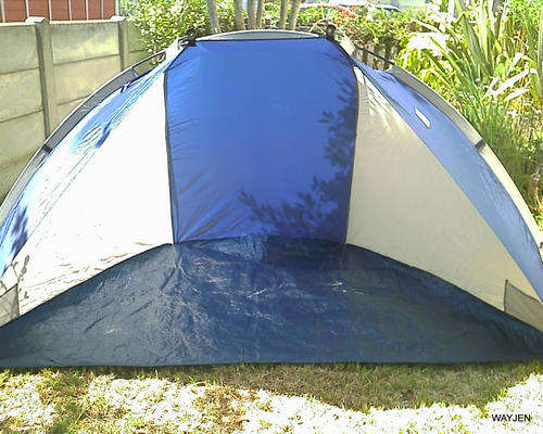 BUSH BABY. BEACH SUN COVER. OPENS UP IN A 1/2 DOME.