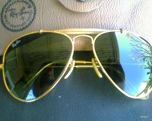 GENUINE RAY-BAN. B/L ENGRAVED IN LENS. NOT SURE WHAT MAKE IT IS.