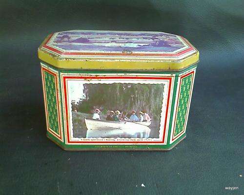 OLD LOOKING STORAGE TIN WITH PICTURES COURTESY OF THE CAPE ARCHIVES AND UCT ARCHIVES. TIN HAS RUST.