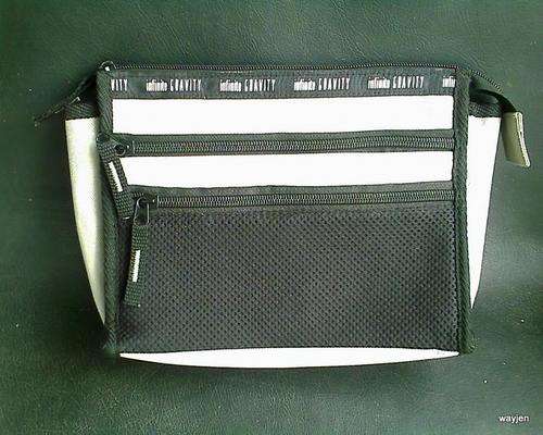 INFINITE GRAVITY TOILETRY BAG. PLEASE NOTE THE BAG IS MARKED.