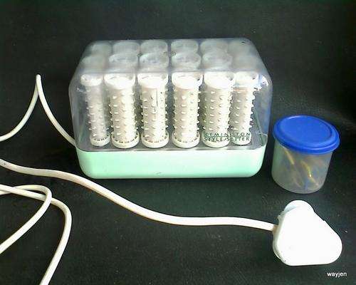 REMINGTON STYLE SETTER HOT CURLERS. 18 CURLERS IN SET WHICH INCLUDES PINS. WORKING.