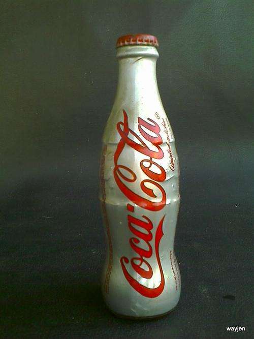 COCA COLA LIMITED EDITION BOTTLE WITH COLA INSIDE. 2003.