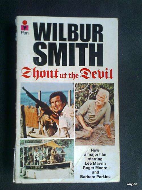 WILBUR SMITH. SHOUT AT THE DEVIL. PAPERBACK. 351 PAGES.SOME PAGES LOOSE FROM SPINE. BOOK HAS WEAR.