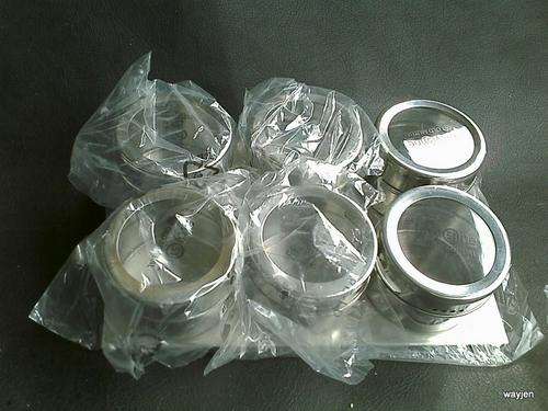 6  X MAGNETIC STAINLESS STEEL SPICE JARS ON STAND. OLD MUTUAL FIFTY ONE. NEW.