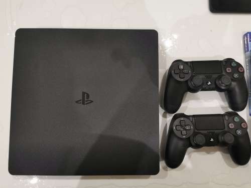 PlayStation 4 500GB Console + 3 Games and 2 controllers