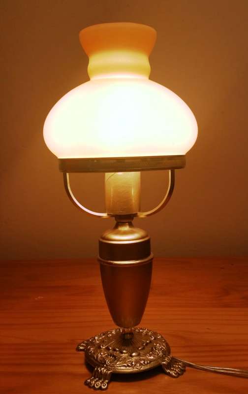 BRASS AND GILT TABLE LAMP WITH STUDENT SHADE