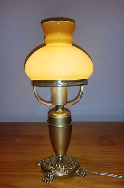 BRASS AND GILT TABLE LAMP WITH STUDENT SHADE