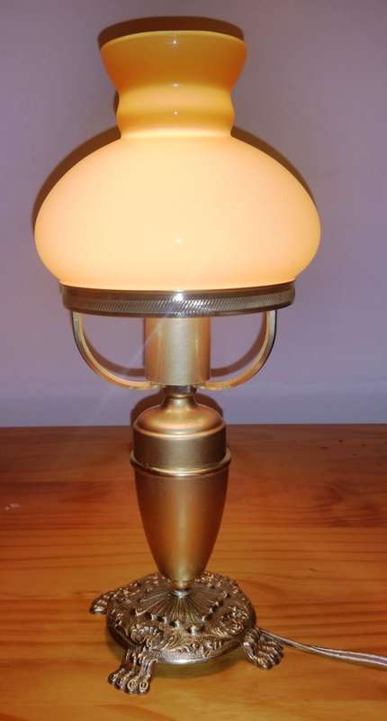 BRASS AND GILT TABLE LAMP WITH STUDENT SHADE