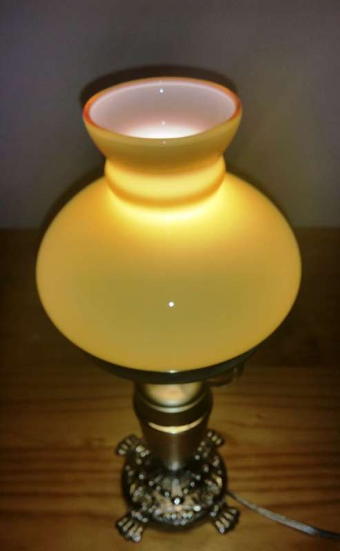 BRASS AND GILT TABLE LAMP WITH STUDENT SHADE
