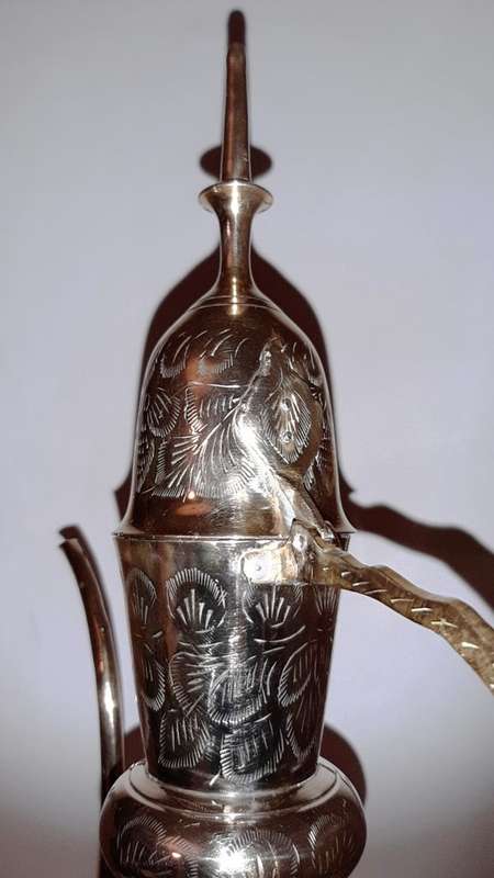 TWO LARGE BRASS DALLAH / SARNA / INDIAN TEAPOTS ON ORNATE BRASS TRAY