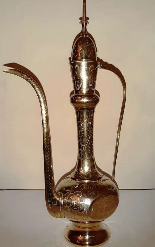 TWO LARGE BRASS DALLAH / SARNA / INDIAN TEAPOTS ON ORNATE BRASS TRAY
