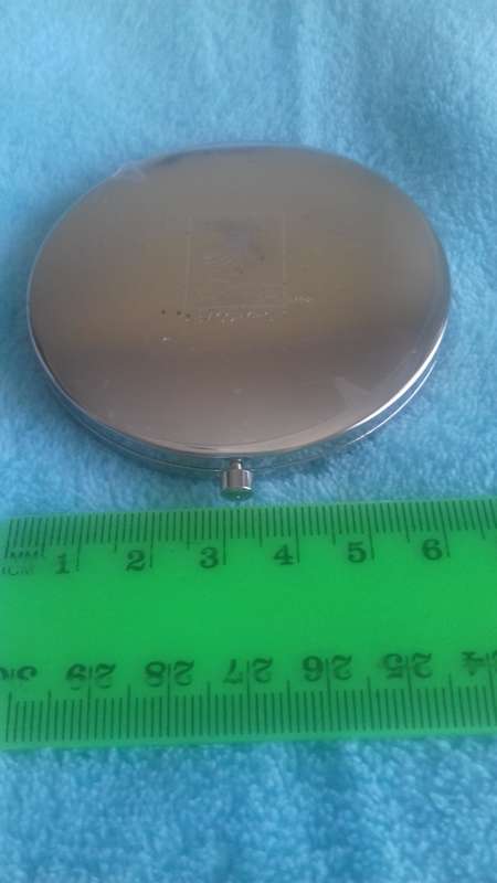 Small handheld mirror