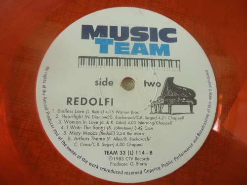 REDOLFI- 1983 TEAM MUSIC STEREO LP TEAM 33 - ORANGE VINYL