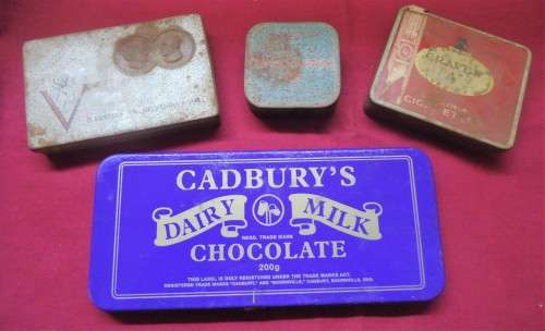 SA WORLD WAR II TIN & THREE OTHER TINS in varying condition