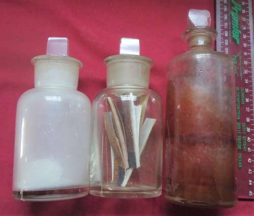THREE DIFFERENT SIZE CLEAR GLASS VINTAGE CHEMIST-APOTHECARY BOTTLES WITH GLASS STOPPERS -SEE PHOTOS